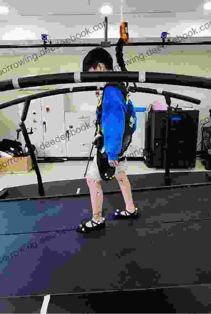 A Person Walking On A Treadmill, With Markers Attached To Their Body For Gait Analysis Measuring Walking: A Handbook Of Clinical Gait Analysis