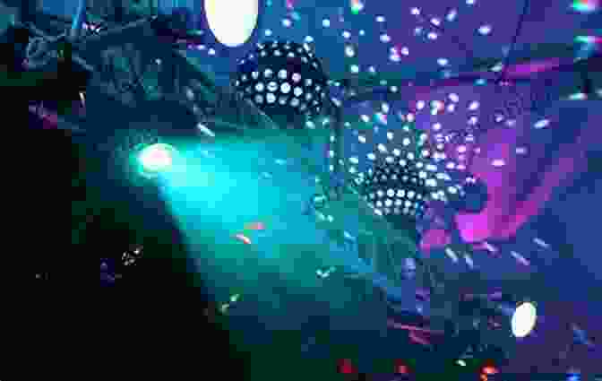 House Music DJ Performing In A Nightclub With Flashing Lights And Dancing Crowd Electronic Dance Music: History Of Trance House Progressive House